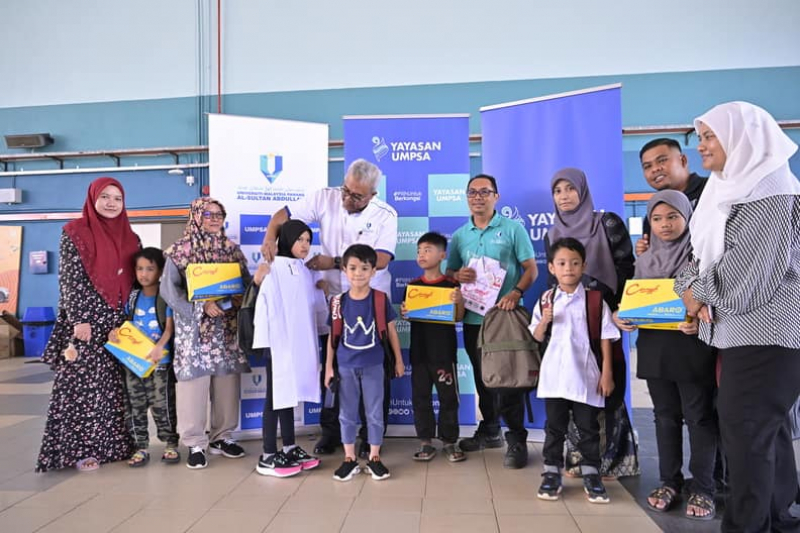 Yayasan UMPSA distributes 'Back To School' donations for staff children in need